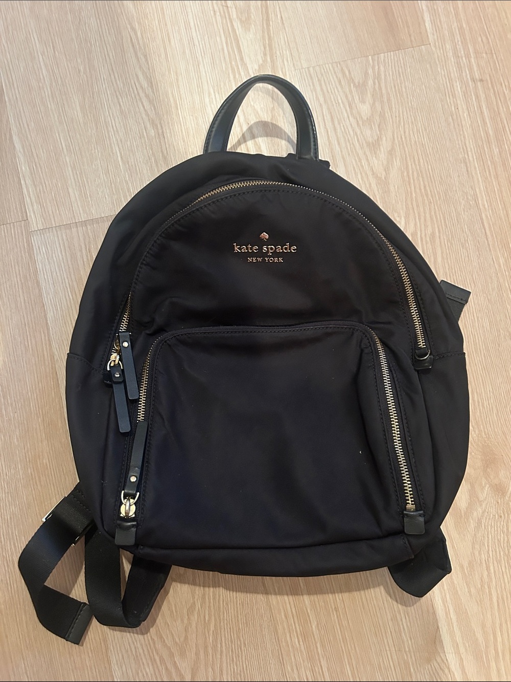 kate spade black nylon backpack with gold hardware